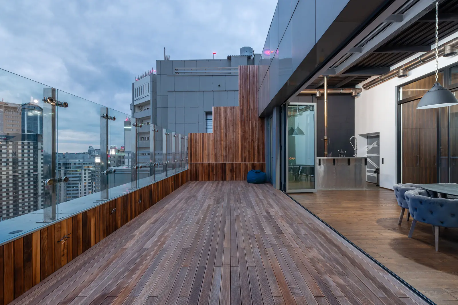 The private terrace of Penthouse 21, decked in timber above the quarter