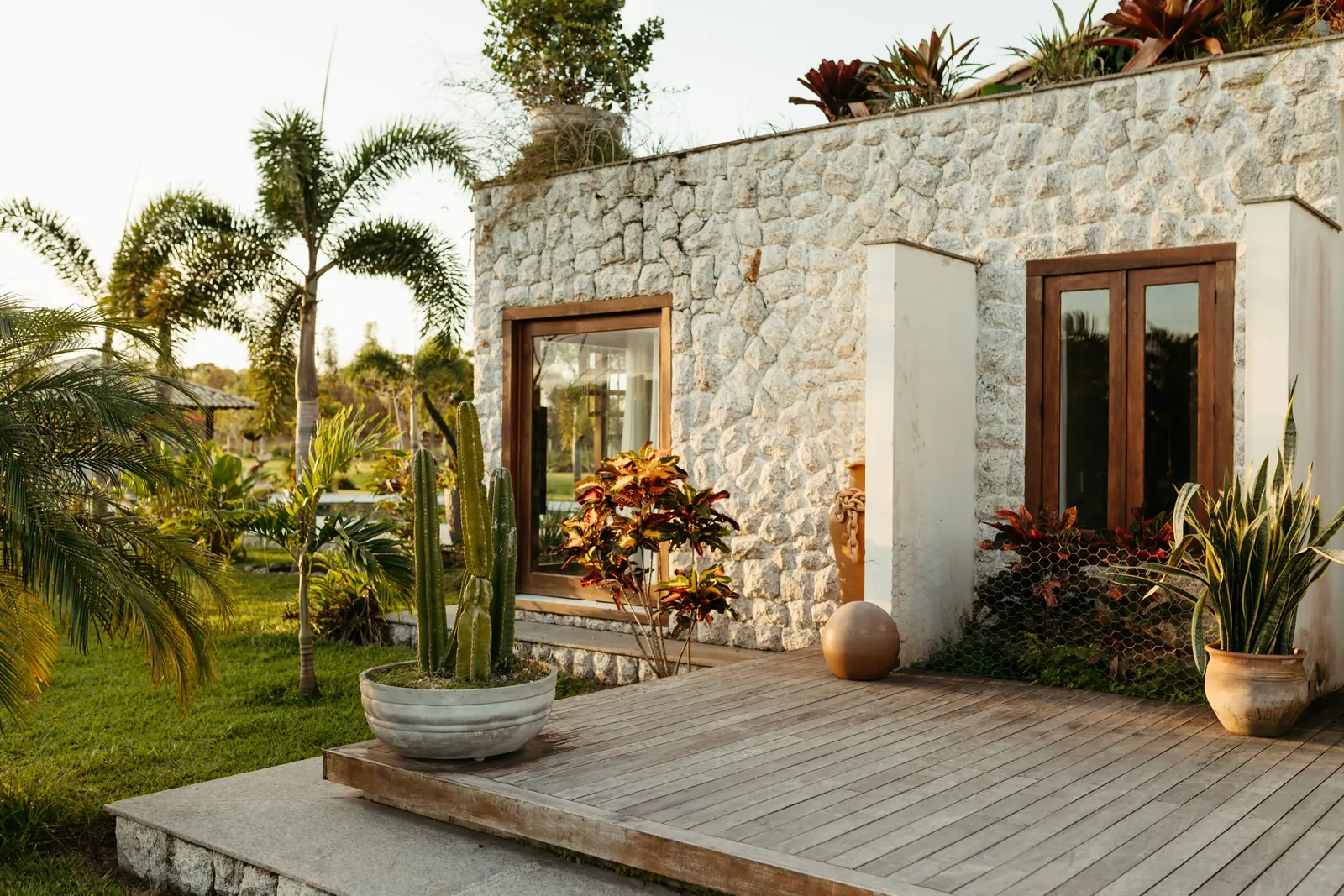 Saltmere Point: the terrace outside a residence, planting kept close to the stone
